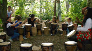 Kids playing drums at New Ark Adventure Playground in Peterborough