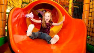 Girl on slide at Leos Funzone Huntingdon