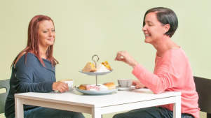 Women having afternoon tea at The Hive Soft Play in Bathgate