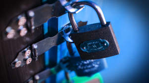 Padlock on door in escape room at Clue HQ