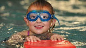 Girl in swimming pool at King Alfred Leisure Centre in Hove