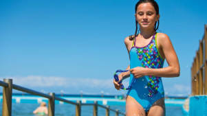 Girl in outdoor swimming pool at Swan Pool and Leisure Centre in Buckingham