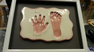 Hand prints pottery at ClayArt in Plymouth