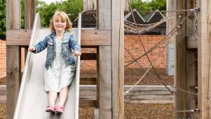 Little girl on slide 