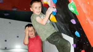Boys on climbing wall at The Ballroom Climbing Wall in Coventry