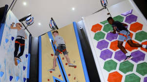 People climbing at Clip n Climb Dundonald in Belfast