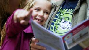 A little girl pointing on a treasure trail