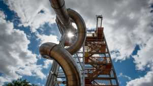 View of the giant spiralling slides at Gripped London, part of the outdoor adventure park attractions