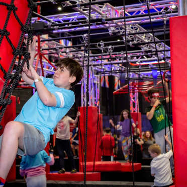 kids climbing obstacle course