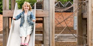 Little girl on slide 