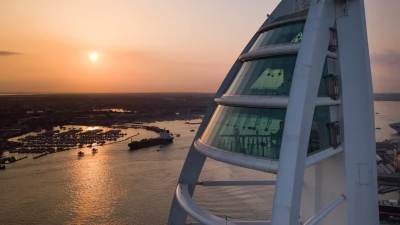 Spinnaker Tower on Portsmouth waterfront with boats and marina below – Landmark attraction offering 23-mile views across the Solent.