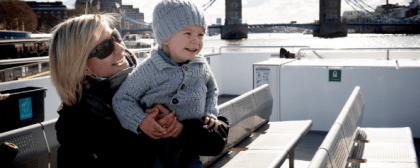 grandmother and child on city cruises boat