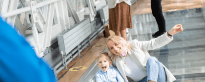 mother and son on glass floor