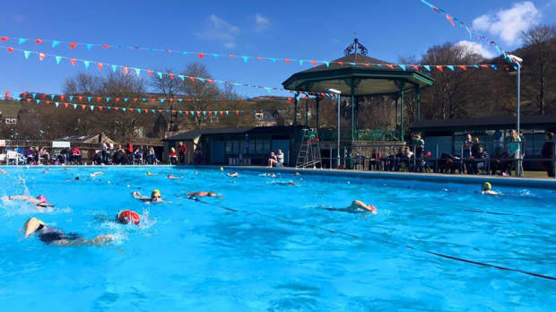 People swimming at Hathersage Open Air Heated Pool
