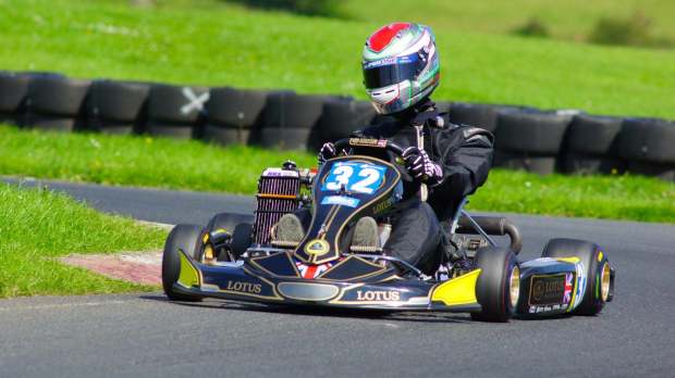 Person go kart racing at Glan Y Gors Park Karting in Corwen