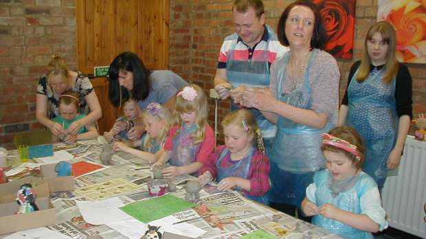 Families doing pottery at The Potters Barn in Sandbach
