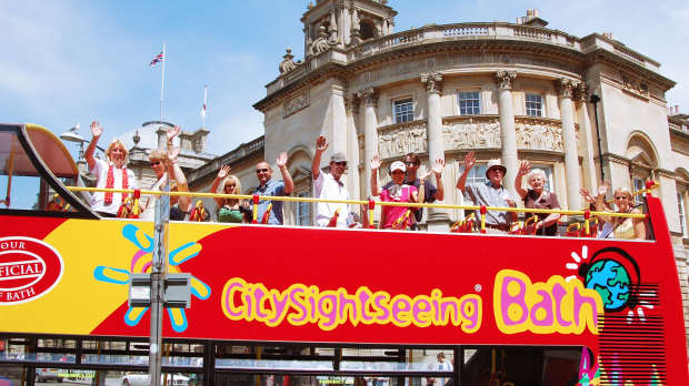 Passengers on City Sightseeing Bath Hop on Hop off Tour bus