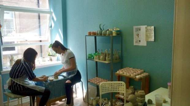 People doing crafts at The Craft Pottery in Glasgow