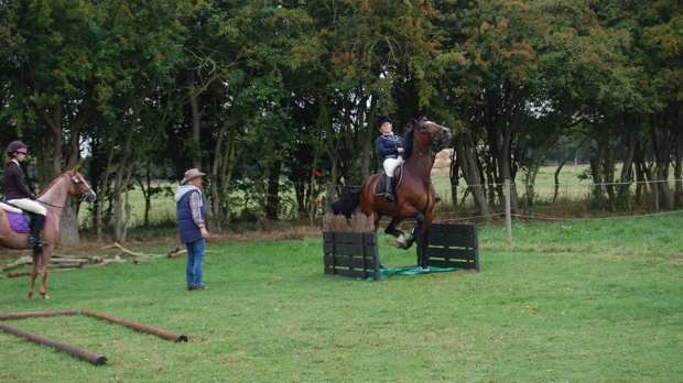 Boy riding horse at Faldingworth Equestrian Centre 
