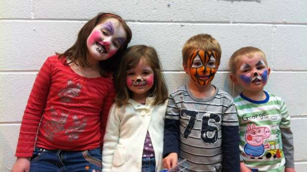 Kids with face paint at Tumble Town Adventure Land in Leeds