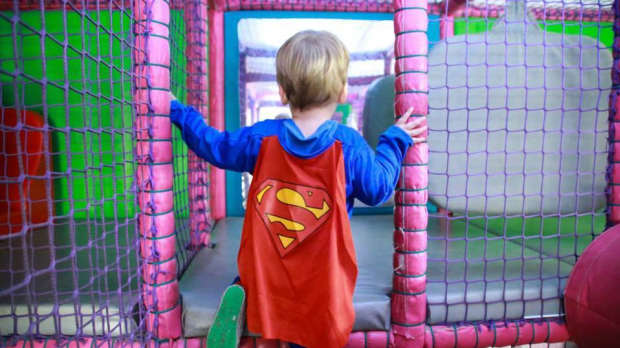 Boy in costume playing at Piglets - Indoor soft Play in Hersham
