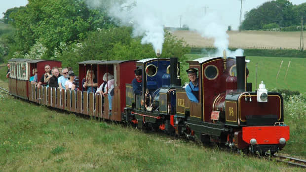 Families on miniature train at Wells and Walsingham Light Railway in Wells-next-the-Sea