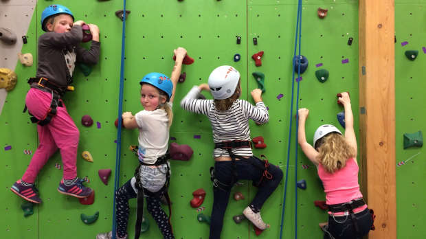 Kids climbing at Wall in the Hall in Tiverton