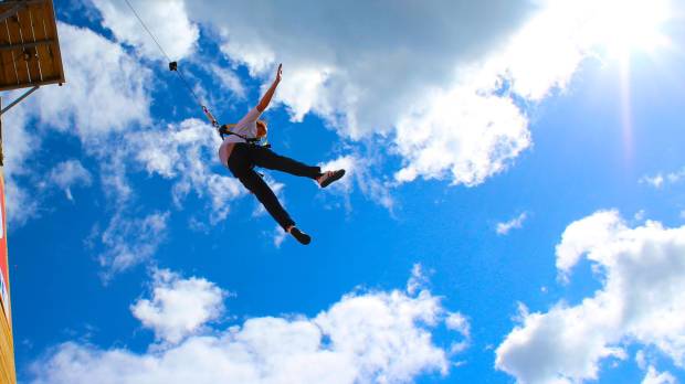 Person on high rope course at Dunmore East Adventure Centre in Waterford