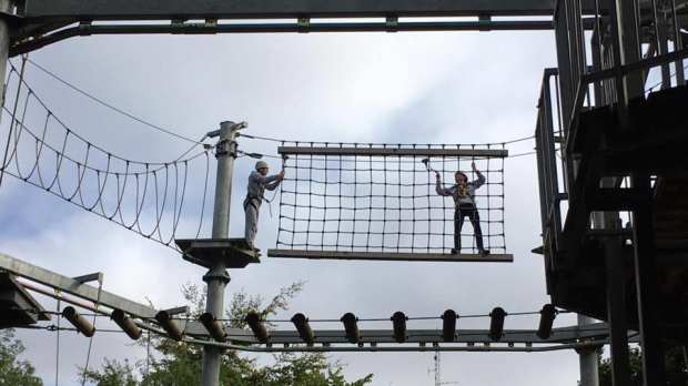People on high rope course at SkyTrek in Belfast