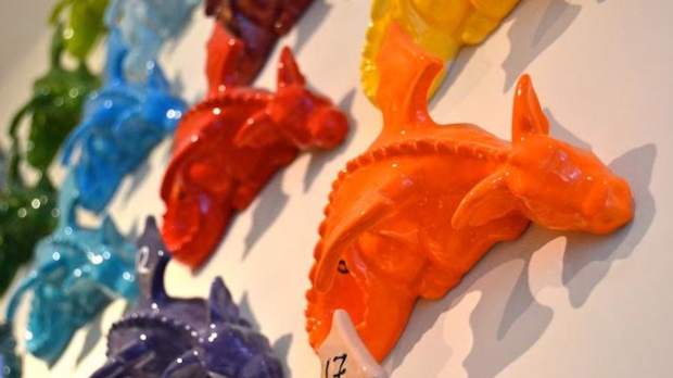 A line of painted ceramic dragons