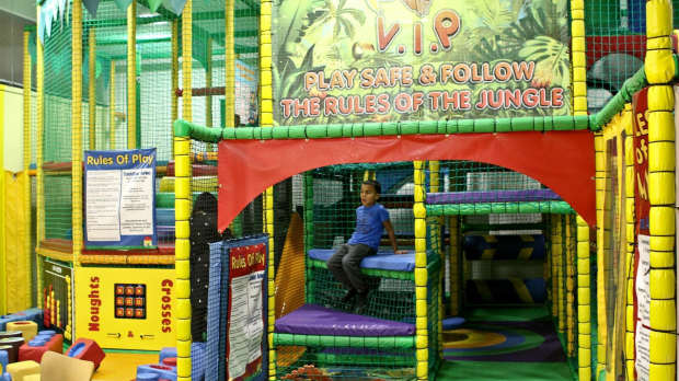Boy on soft play frame at Jungle Versatile Indoor Play in Hounslow