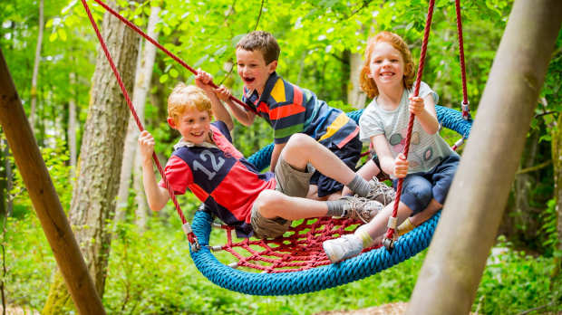 Kids on swing at Bowhill House and County Estate in Selkirk