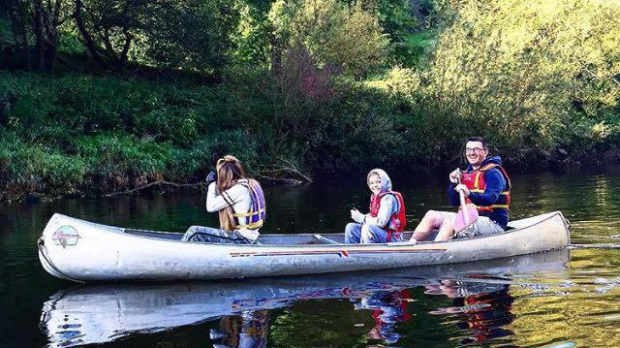 Family canoeing at Wyedean Canoe and Adventure Centre in Ross on Wye