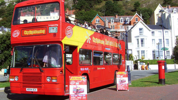 Passengers on City Sightseeing Llandudno Hop on Hop off Tour bus