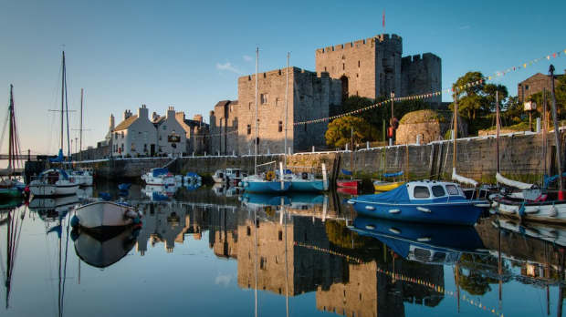 Boat on lake by Castle Rushen in Castletown
