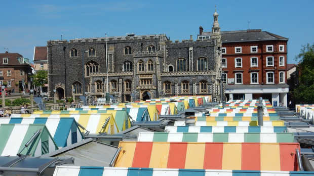 Market stalls by Guildhall in Curious About Norwich tour
