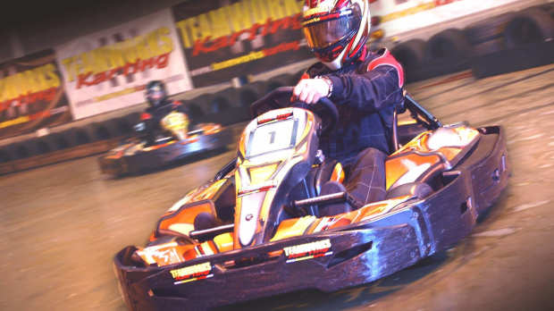 Person go kart racing at Teamworks Karting Birmingham