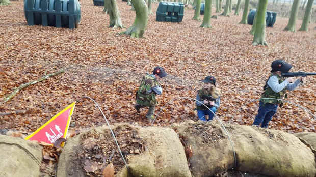 Kids in paintball battle at Combat Paintball in Thetford