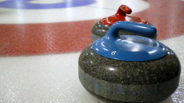 Curling stones by target at Hamilton Ice Rink