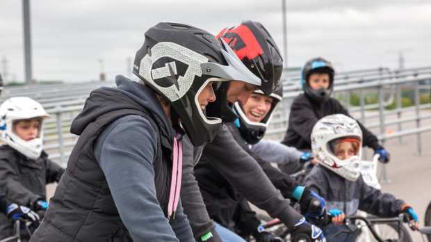 Family cycling at Cyclopark in Gravesend