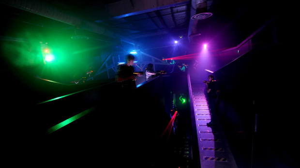 Kids playing laser tag at Laser Quest in Manchester
