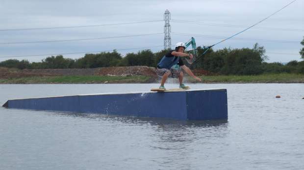 Man wakeboarding at Middlemoor Water Park in Woolavington