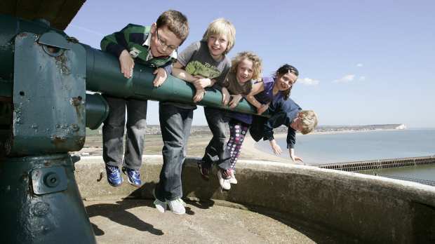 Kids on cannon at Newhaven Fort