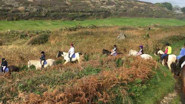 People horse riding at Newton Equestrian in Helston
