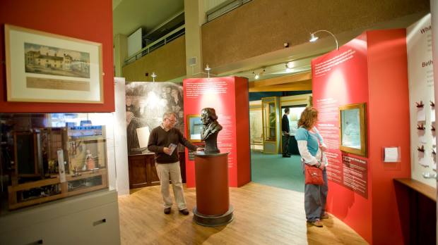 People looking at displays at Newport Museum and Art Gallery