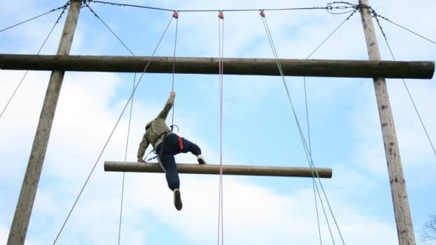 Person on high rope course at The Edge Adventure Activities in Much Wenlock