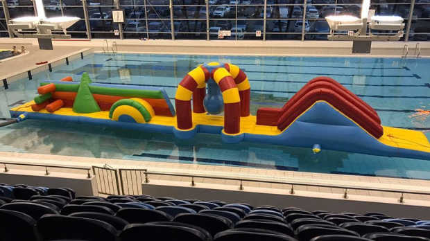 Inflatable obstacle course on swimming pool at Braintree Swimming Centre