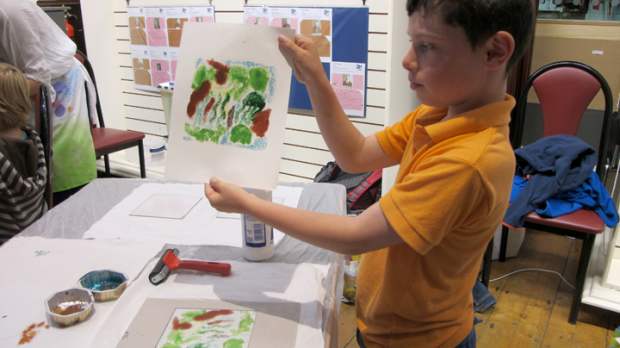 Boy painting at National Maritime Museum of Ireland in Dun Laoghaire