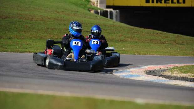 People racing on go karts at Thruxton Race Circuit in Andover