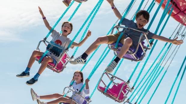 Kids enjoying a ride at Harbour Park, Littlehampton